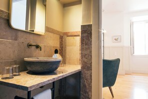 Shower, rainfall showerhead, hair dryer, towels