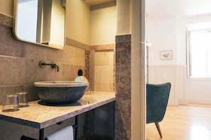 Shower, rainfall showerhead, hair dryer, towels