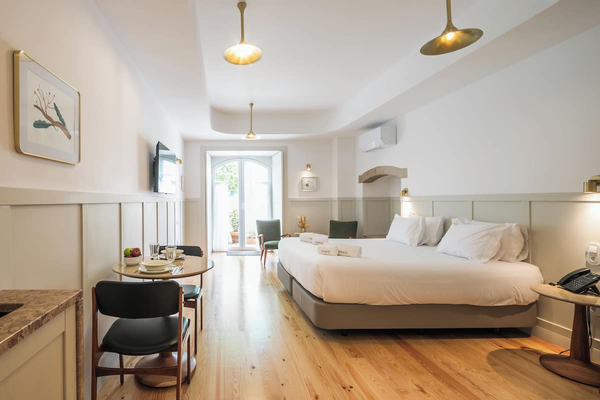 Deluxe Double Room, Patio | Soundproofing, iron/ironing board (on request), WiFi (free)