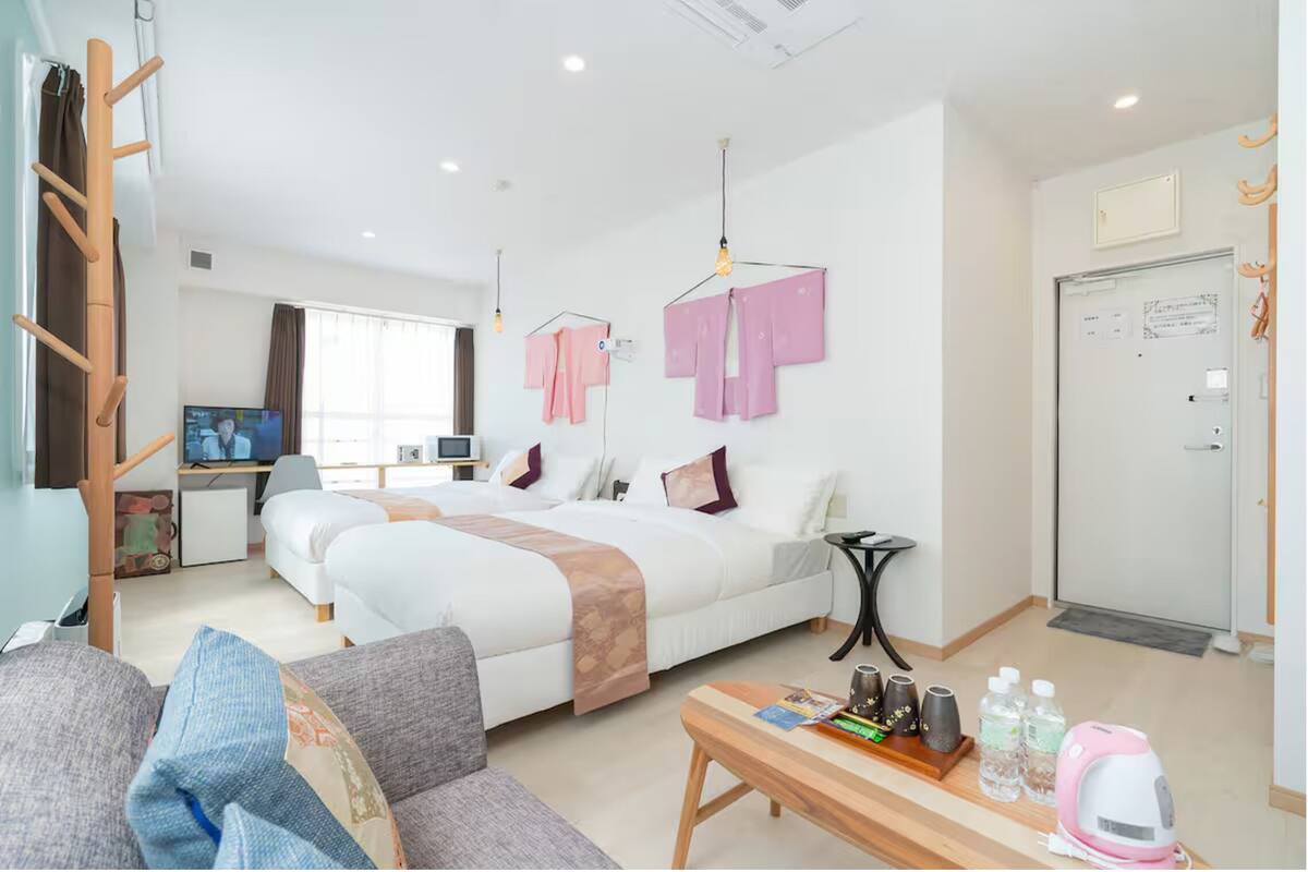 Family Twin Room, Non Smoking | Desk, laptop workspace, iron/ironing board, free WiFi