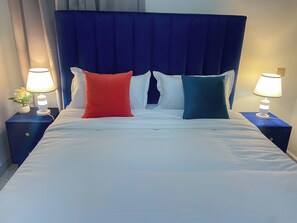 1 غرفة نوم ومكواة/لوح كي وواي فاي وملاءات أسرّة