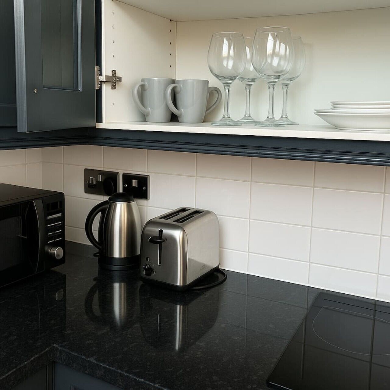 Coffee/tea maker, fridge, microwave, oven