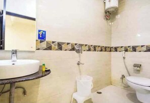 Shower, rainfall showerhead, free toiletries, slippers - HOTEL Tralveller In LUCKNOW (Lucknow)