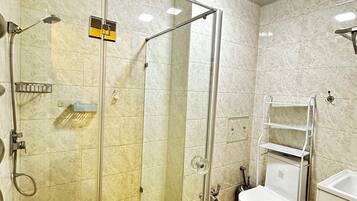 Shower, hair dryer, towels, soap