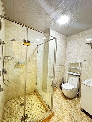 Shower, hair dryer, towels, soap