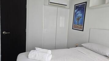 Comfort Condo, Balcony, City View | In-room safe, desk, iron/ironing board, free WiFi