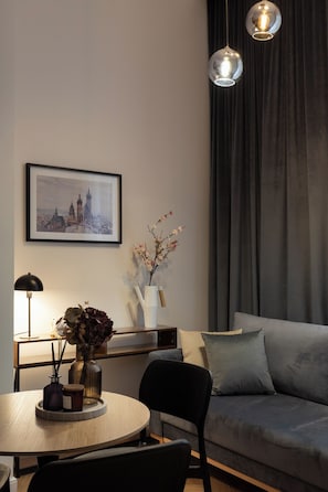 Deluxe Studio Suite, 1 Double Bed with Sofa bed | Living area | 35-inch flat-screen TV with cable channels