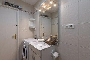 Hair dryer, towels, soap, toilet paper