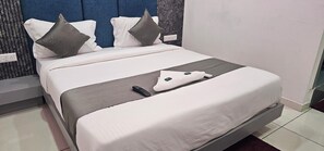 Deluxe Room, City View | Laptop workspace - Hotel S S Town (Vadodara)