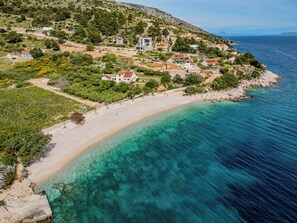 On the beach, sun-loungers, beach towels