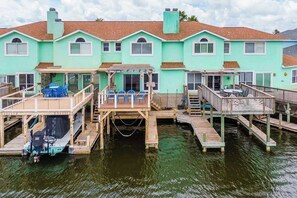 A waterfront property with multiple decks and a dock. - Shore Thing: Waterfront Dock & Family Fun (Corpus Christi)