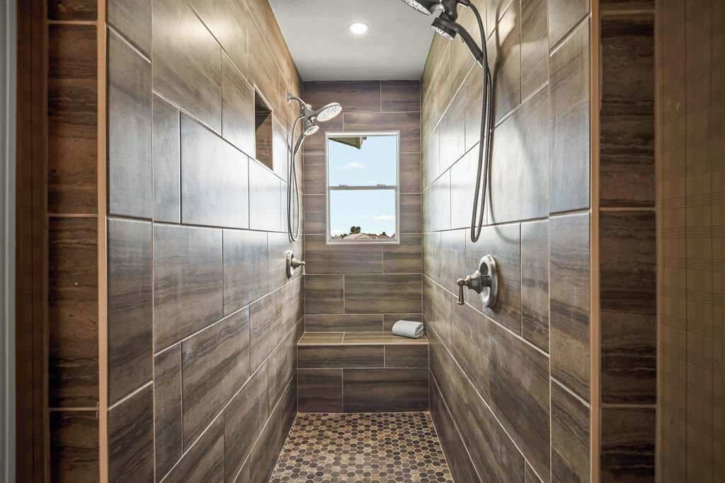 Shower, hair dryer, towels, shampoo
