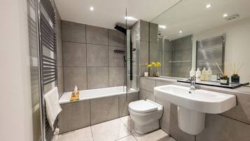 Hair dryer, towels, soap, toilet paper