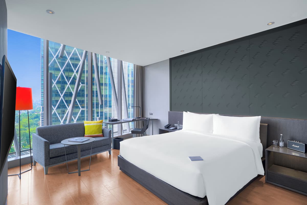 Executive Double Room, City View | In-room safe, desk, laptop workspace, blackout drapes