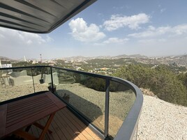 Suíte júnior, 1 cama King, vista para o parque | Terraço/pátio