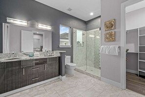 Shower, hair dryer, towels, shampoo
