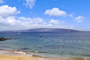 On the beach, sun-loungers, beach towels