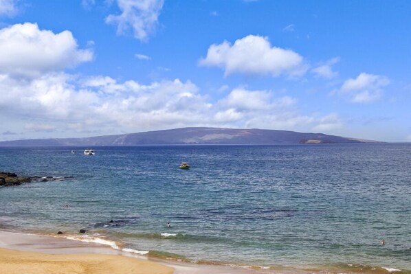 On the beach, sun-loungers, beach towels