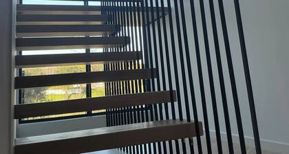 Enjoy a relaxing getaway in our new luxury apartment, central to most amenities