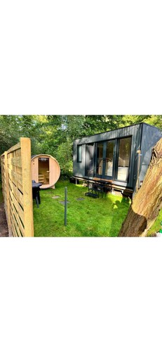 Charming tiny house by the lake with outdoor sauna