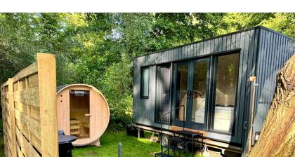 Charming tiny house by the lake with outdoor sauna