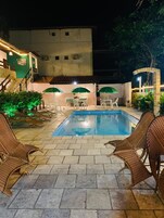 Outdoor pool, open 9:00 AM to 9:00 PM, pool umbrellas, sun loungers