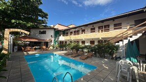 Outdoor pool, open 9:00 AM to 9:00 PM, pool umbrellas, pool loungers