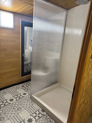 Shower, towels, soap, shampoo