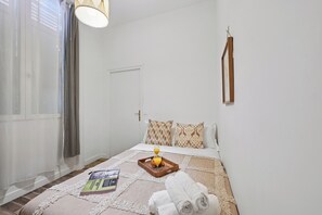 City Apartment, 1 Bedroom, Non Smoking | Iron/ironing board, cribs/infant beds, travel crib, free WiFi