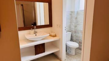 Shower, towels, soap, shampoo