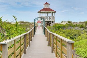 A wooden boardwalk leading to a private property with a gazebo. - Cape San Blas Gem w/ Sunrise + Sunset Views (Port St. Joe)