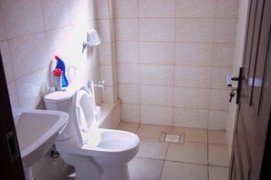 Shower, bidet, towels, soap
