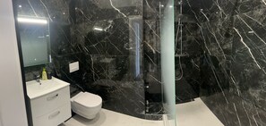 Hair dryer, towels, soap, toilet paper