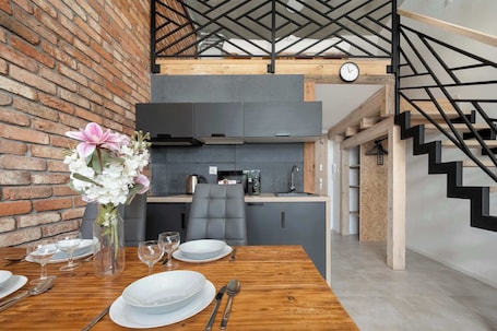 Dining. Modern Studio with Mezzanine | Close to Airport, Balcony