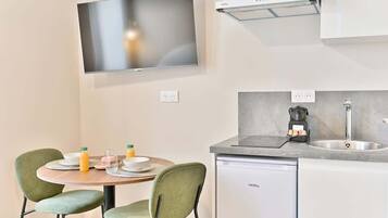 Fridge, stovetop, coffee/tea maker, cookware/dishes/utensils