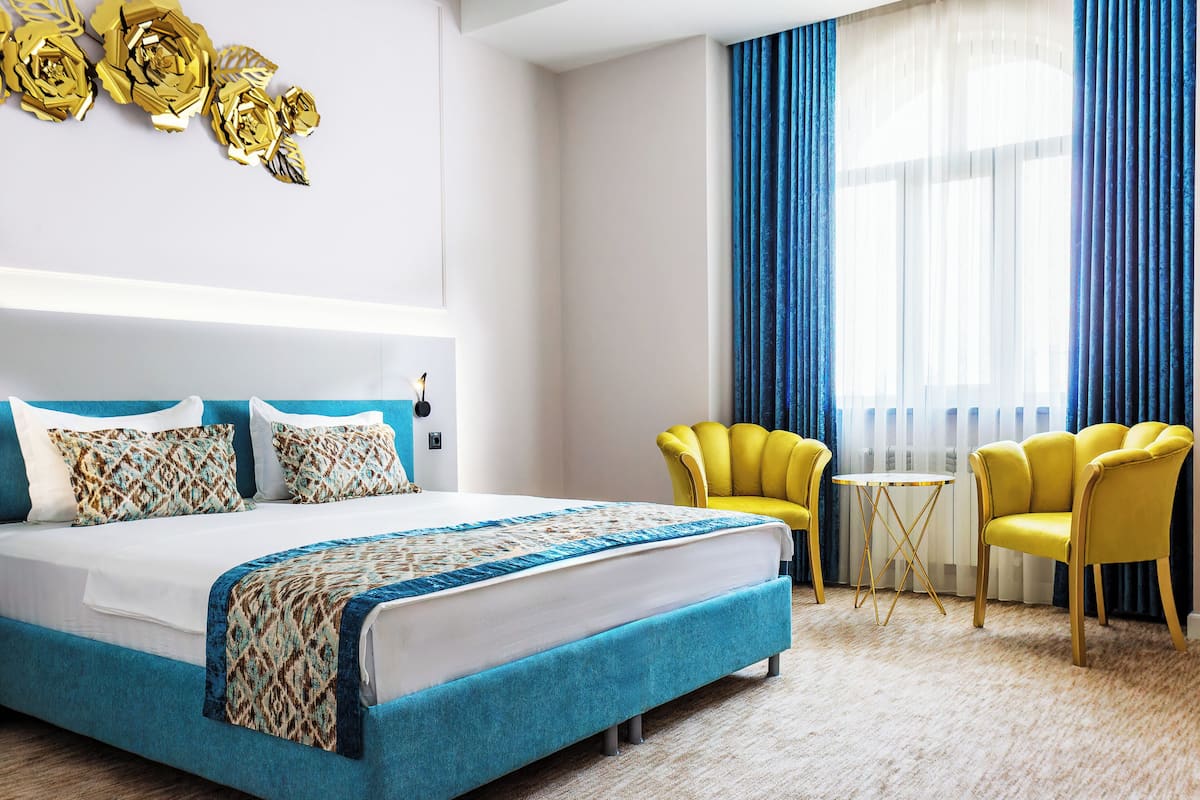 Luxury Double or Twin Room, City View | In-room safe, desk, laptop workspace, blackout drapes