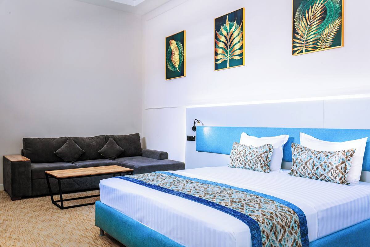 Family Room | In-room safe, desk, laptop workspace, blackout drapes
