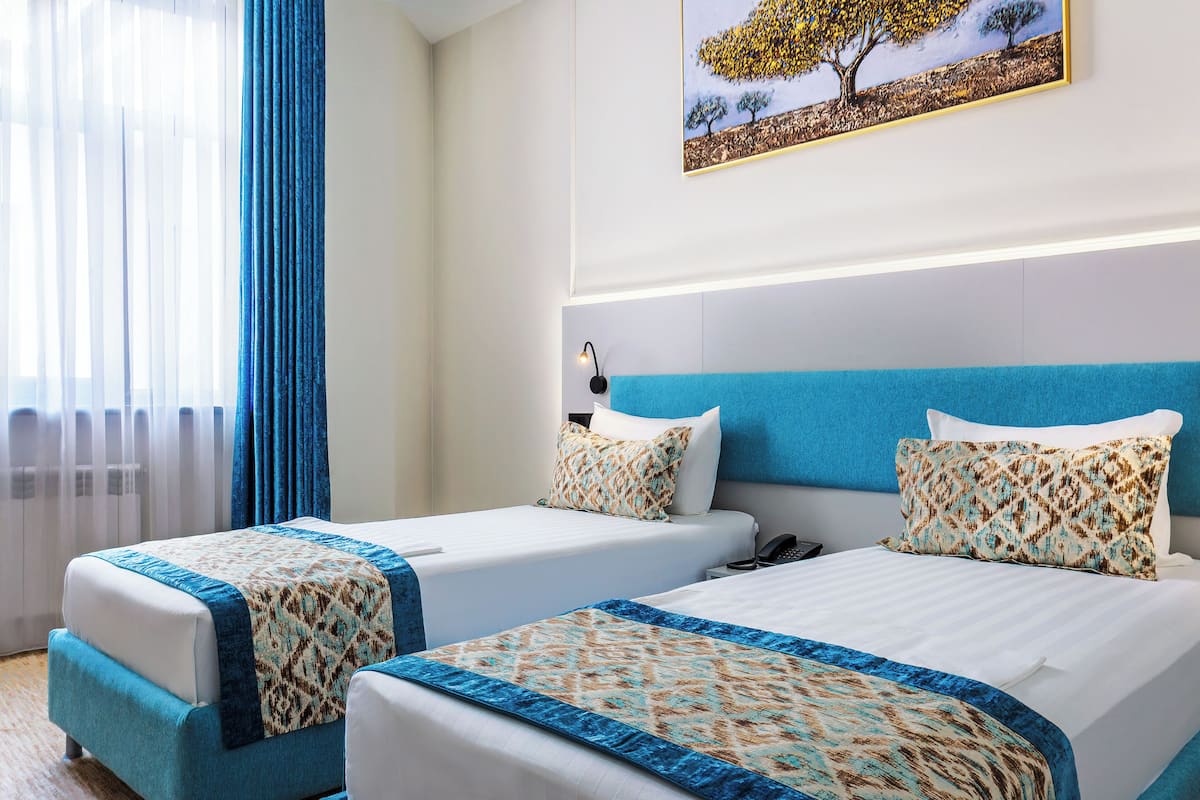 Standard Double or Twin Room, Garden View | In-room safe, desk, laptop workspace, blackout drapes