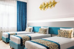 Deluxe Triple Room, Garden View | In-room safe, desk, laptop workspace, blackout drapes - COCO HOTEL (Tashkent)