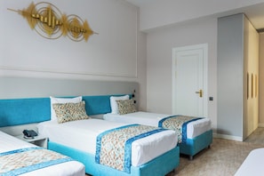 Deluxe Triple Room, Garden View | In-room safe, desk, laptop workspace, blackout drapes - COCO HOTEL (Tashkent)