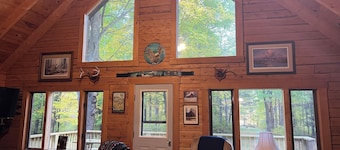  Rustic Forest Getaway has the comforts of home surrounded by woods and water.