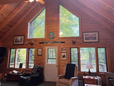  Rustic Forest Getaway has the comforts of home surrounded by woods and water.