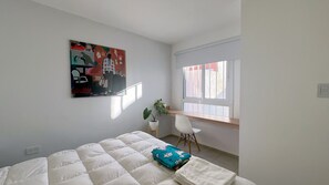 1 bedroom, desk, iron/ironing board, travel crib