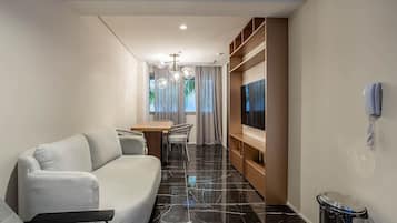 Basic Apartment | Living area | 32-inch Smart TV with digital channels