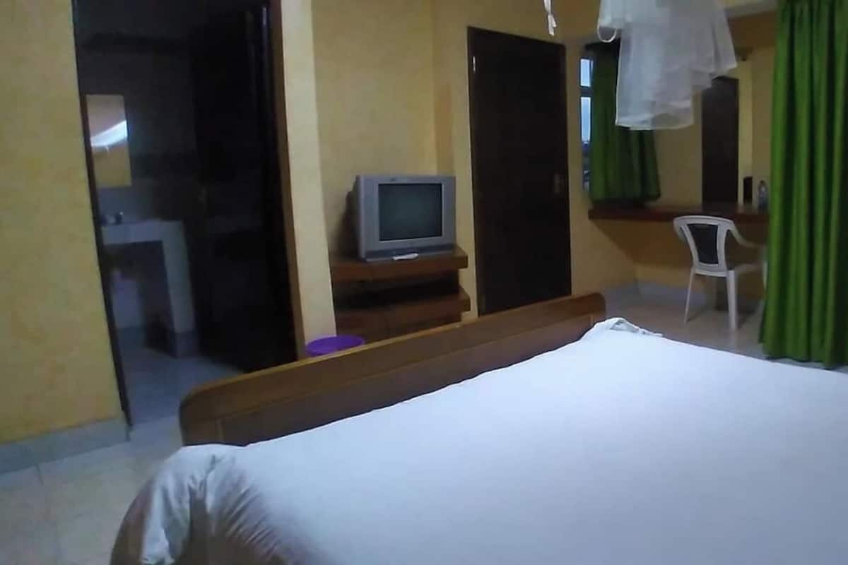 Quarto casal luxo, vista para a cidade | Wi-Fi de cortesia, roupa de cama