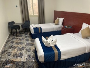 In-room safe, desk, laptop workspace, blackout curtains - Al-Qemma Hotel (Makkah)