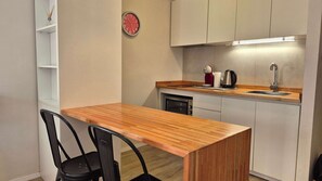 Microwave, oven, coffee/tea maker, cookware/dishes/utensils