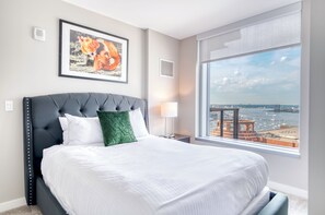 Luxury Apartment, Balcony, City View | Desk, laptop workspace, iron/ironing board, free WiFi