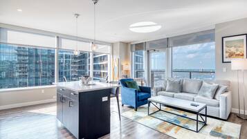 Luxury Apartment, Balcony, City View | Living area | TV