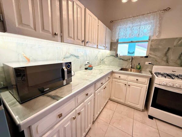 Fridge, microwave, oven, stovetop